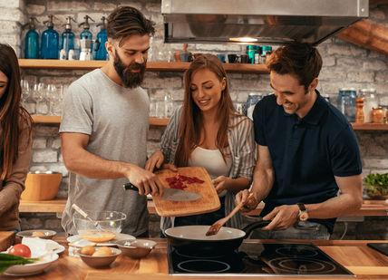 An image of a group of people cooking together, Online. The Chef and The Dish
