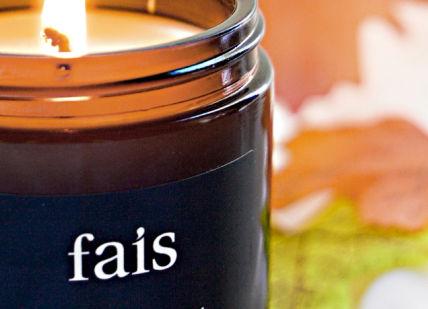An image of a candle with a fall leaf, Private Luxury Vegan Candle Making Workshop. Fais HQ