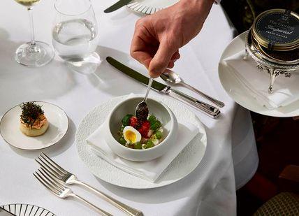 An image of a dish of food in a bowl, Three-course Lunch. The Goring Dining Room