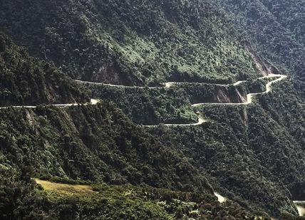 An image of a mountain road in the mountains, Death road biking tour. Gravity Bolivia