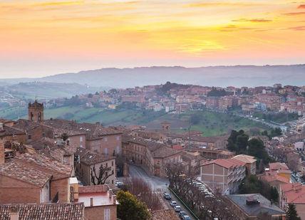 An image of the town of siena at sunset, Private Cooking Class with chef In 17th Century Italian Villa. The Italian on Tour