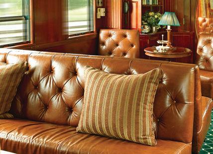 An image of a train car with leather couches, Pretoria to Victoria Falls by Train. Rovos Rail