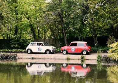 An image of a car parked on a bridge, Romantic London Tour in a Classic Mini Cooper. smallcarBIGCITY