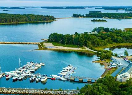 An image of a small island with boats in it, A Private Oak Island Experience. Tony Sampson