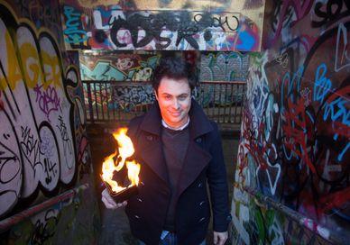 An image of a man holding a fire, Magic Masterclass with Dinner and Drinks. inamo Restaurants