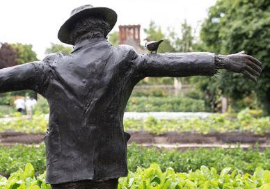 An image of a statue of a man in a garden, Full day gardening course. Le Manoir aux Quat'Saisons, A Belmond Hotel