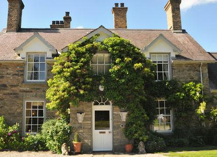 An image of a house with a lot of plants, Welsh Gourmet Getaway. Tyddyn Llan