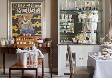 An image of a table with a tea set, Afternoon Tea. The Egerton House Hotel