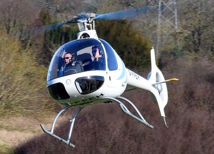 An image of flying Guimbal Cabri G2 helicopter