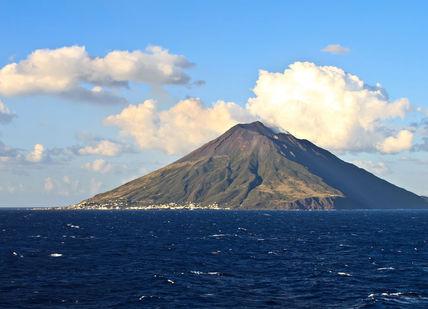 An image of a mountain in the ocean, Volcanic Adventure on Stromboli. Getaway-Pseudo-Supplier