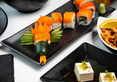 An image of a plate of food on a table, Sushi and Sake Masterclass. inamo Restaurants