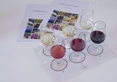 An image of a glasses of wine and grapes, One Day Wine Course. The London Wine Academy