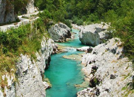 Emerald Waters in Medieval Slovenia: Paragliding and River Adventure