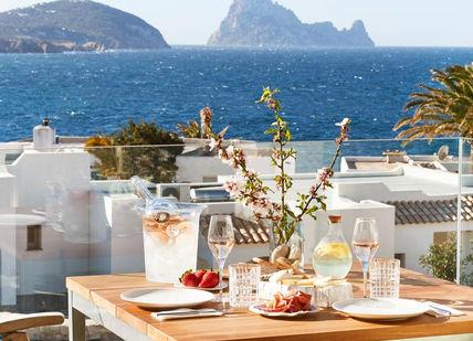 An image of a table with food and drinks on it, Pure Signature Massage at Ibiza. 7Pines Kempinski Ibiza Resort