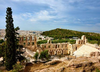An image of a city from a hill, Admission to the Acropolis museum. Acropolis museum