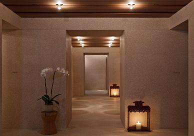 An image of a hallway with candles and flowers, Weekday Escape Package. Akasha Holistic Wellbeing Centre at Hotel Cafe Royal
