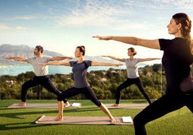 An image of a group of people doing yoga, Seven-Day Sleep Recovery Programme. Albir Hills Resort S.A.U. (SHA Wellness Clinic)