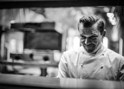 An image of a man in a kitchen, 5-course tasting menu. Alex Dilling at Hotel Cafe Royal