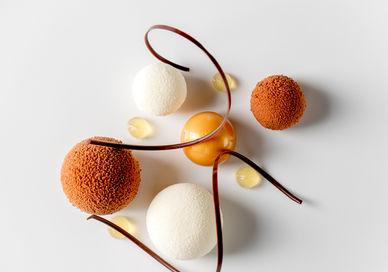 An image of three desserts on a white surface, 5-course tasting menu. Alex Dilling at Hotel Cafe Royal