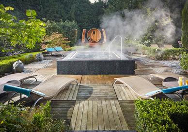 An image of a hot pool in the backyard, Luxury Spa Day With Oskia Treatment. Alexander House Hotel