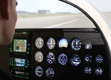 An image of a man in a plane cockpit, 1h trial lesson in 4 seater plane. Almat Flying Academy