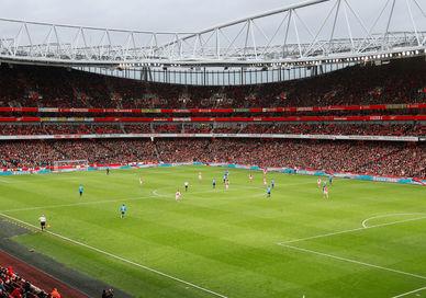 An image of a soccer match in a stadium, The Arsenal Football Club PLC. The Arsenal Football Club PLC
