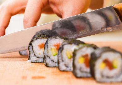 An image of someone cutting a sui, Fushi Sushi Class. Avenue Cookery School