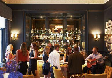 An image of a bar with people sitting at it, Highland Park Scottish Whisky Tasting. Ba'Bar at The Dunstane Houses