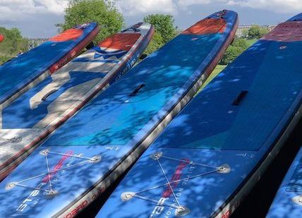An image of a row of surfboards,  2.5 hour Self Guided SUP Adventure. Back of Beyond Adventures
