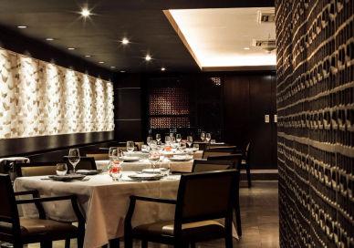 An image of a restaurant with tables and chairs, Benares Restaurant and Bar. Benares Restaurant and Bar