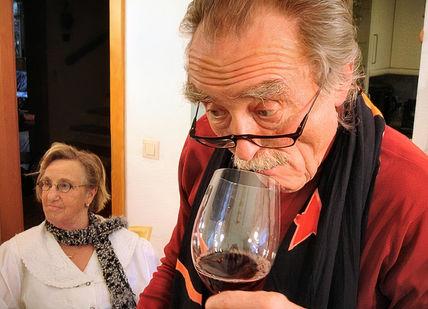 An image of a man with glasses and a wine glass, Kent Wine Tour Experience. Bespoke England Tours