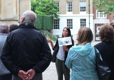 An image of a group of people walking down a street, Private Downton Abbey London Tour. Brit Movie Tours