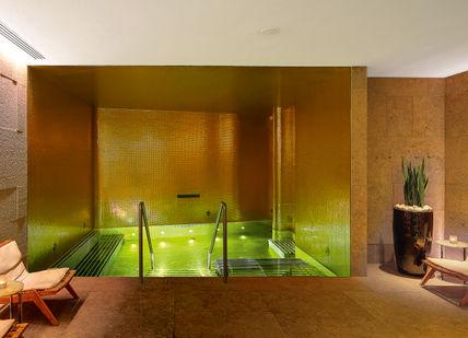 An image of a spa room with a pool, Bulgari Break' Spa Programme. Bulgari Hotel London