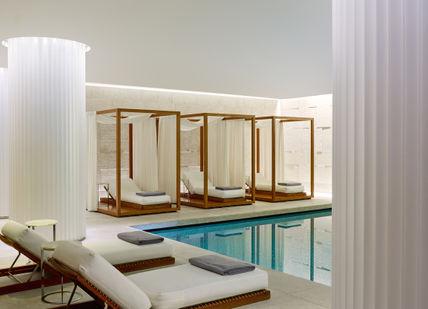 An image of a pool with a lounge chair, Pamper Day with Private Spa Suite. Bulgari Hotel London