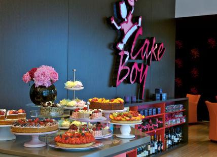 An image of a buffet with fruit and pastries, Private Cupcake Masterclass and Afternoon Tea. Cake Boy