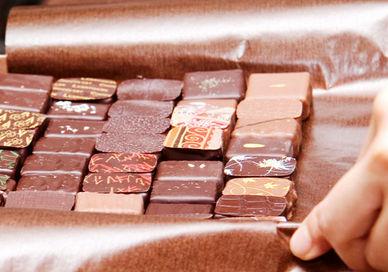 An image of a person holding a box of chocolate, Bespoke Private Half-Day Chocolate Tour. Chocolate Ecstasy Tours