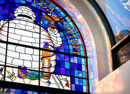 An image of a stained glass window in a building, Claude Bosi at Bibendum. Claude Bosi at Bibendum