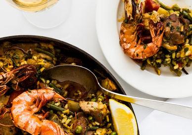 An image of a seafood dish with a glass of wine, 5-Hour Cooking Class. Cookery School at Little Portland Street