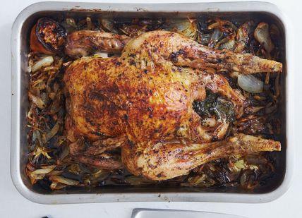 An image of a chicken in a pan with vegetables, The Ultimate 6-Hour Meat & Poultry or Fish & Shellfish. Cookery School at Little Portland Street