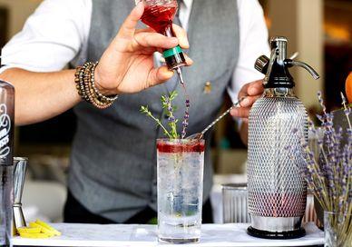 An image of a bartender making a cocktail, Gin & Tonic Masterclass With Three-Course Lunch. D&D - Skylon