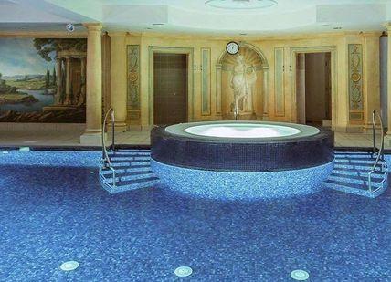 An image of a large indoor swimming pool, The Ultimate Two-Night Spa Break. Danesfield House