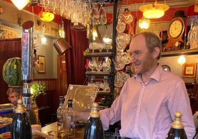 An image of a man in a bar, Edinburgh New Town and Stockbridge Food Tour. Edinburgh Food Safari