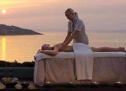 An image of a woman getting a massage, Five Star Greek Spa Getaway. Elounda Mare