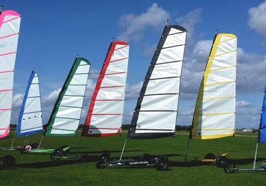 An image of a group of sailboats, Fishy's Land Yachts. Fishy's Land Yachts