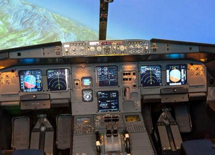 An image of a cockpit with a screen, Airline Route Experience. Flight Simulators Midlands