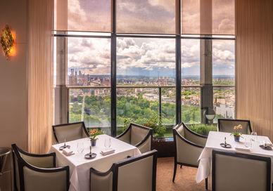 An image of a restaurant setting with a view, 7-course tasting menu. Galvin at Windows