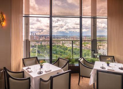 An image of a restaurant setting with a view, 7-course tasting menu. Galvin at Windows