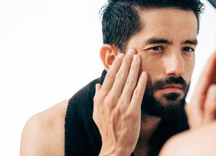 An image of a man shaing his beard, Bespoke Treatment Package. Gentlemen's Tonic