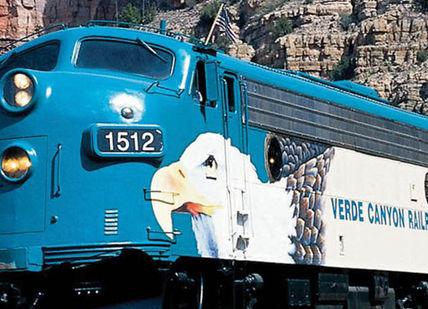 An image of a train going through a canyon, Return transfers between your hotel and the train depot. Get Transfer