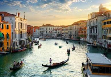An image of a canal in venice, 30-minute Gondola Tour and 2-hour private tour of St. Mark’s Basilica and Doge’s Palace.